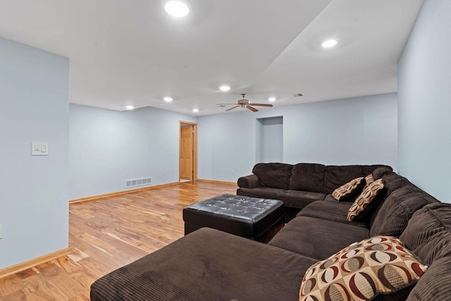 7605 W Windrush Ln, Franklin, WI 53132 - living room featuring baseboards, recessed lighting, ceiling fan, and light wood-style floors