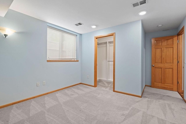 7605 W Windrush Ln, Franklin, WI 53132 - unfurnished bedroom featuring light carpet, baseboards, a spacious closet, a closet, and recessed lighting