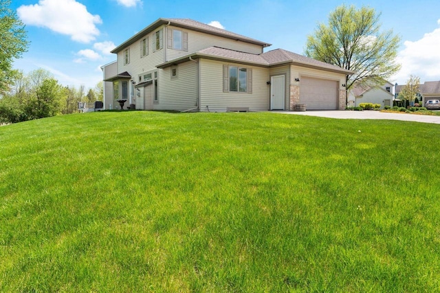 7605 W Windrush Ln, Franklin, WI 53132 - view of front facade with concrete driveway, a front lawn, and an attached garage