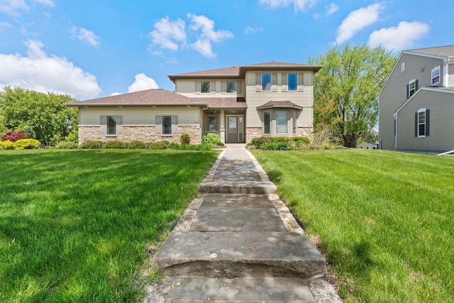7605 W Windrush Ln, Franklin, WI 53132 - view of front of house featuring stone siding and a front lawn