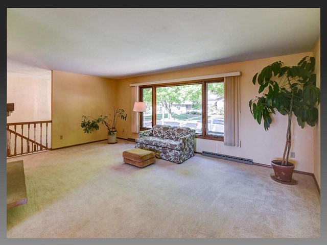 5401 Comanche Way, Madison, WI 53704 - living room with a baseboard heating unit, carpet floors, and baseboards