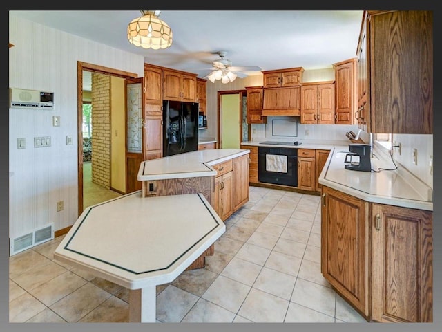 5401 Comanche Way, Madison, WI 53704 - kitchen featuring black appliances, a kitchen island, light countertops, a ceiling fan, and wallpapered walls