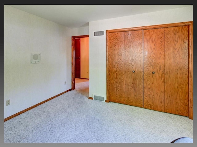 5401 Comanche Way, Madison, WI 53704 - unfurnished bedroom with carpet flooring, a closet, and baseboards