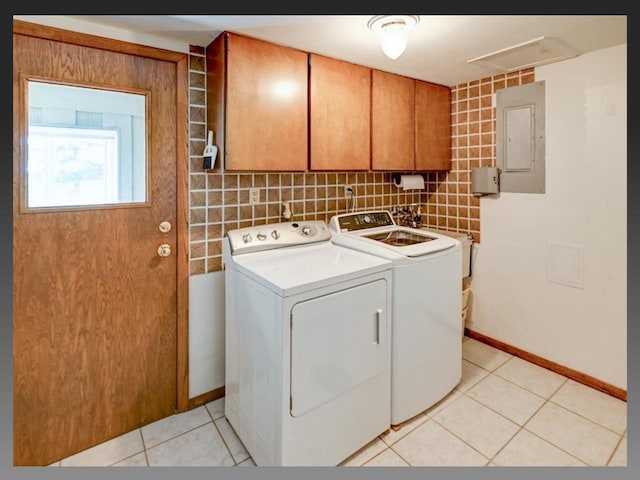 5401 Comanche Way, Madison, WI 53704 - clothes washing area with cabinet space, independent washer and dryer, electric panel, and light tile patterned flooring