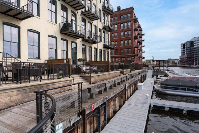 view of property's community featuring a dock