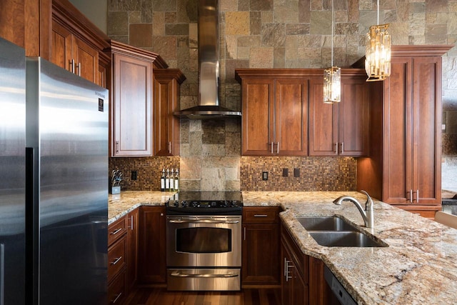 kitchen featuring wall chimney range hood, decorative backsplash, stainless steel appliances, and a sink