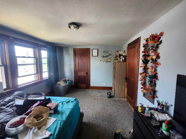 7607 15th Ave, Kenosha, WI 53143 - carpeted bedroom featuring baseboards