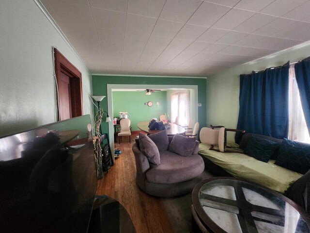7607 15th Ave, Kenosha, WI 53143 - living room featuring crown molding and wood finished floors