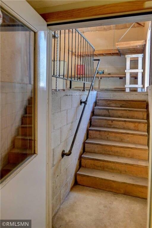 890 Lincoln Ave, Amery, WI 54001 - stairs with concrete block wall