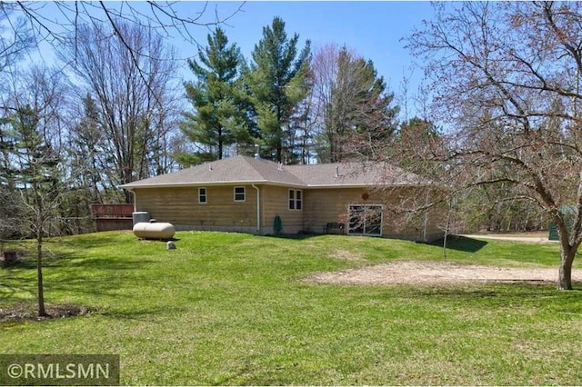 890 Lincoln Ave, Amery, WI 54001 - rear view of property featuring a lawn