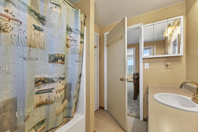1992 London Rd, Green Bay, WI 54311 - full bathroom featuring baseboards and vanity