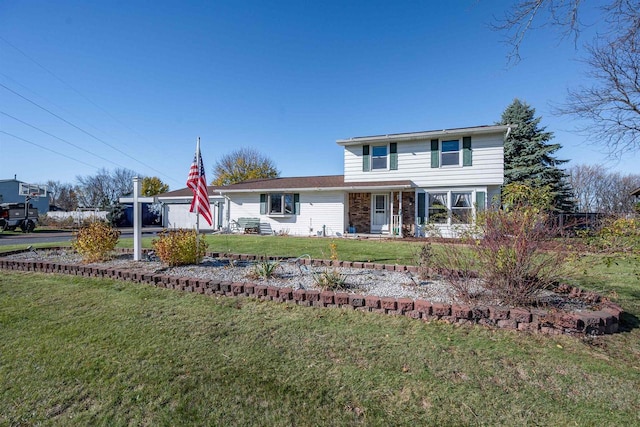 1992 London Rd, Green Bay, WI 54311 - traditional-style home featuring a front lawn