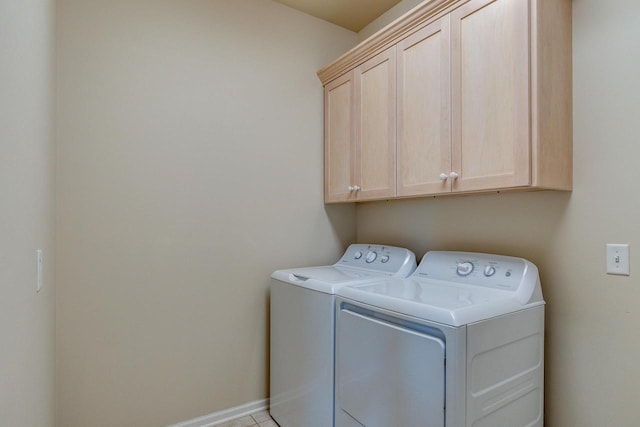 1111 Virgin Lake Dr, Stoughton, WI 53589 - washroom with cabinet space, washer and dryer, and baseboards