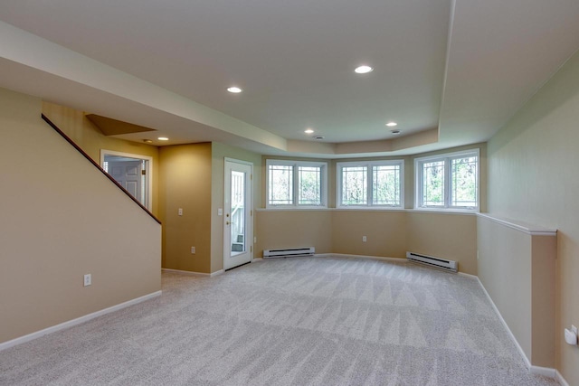 1111 Virgin Lake Dr, Stoughton, WI 53589 - carpeted spare room featuring baseboard heating, recessed lighting, baseboards, and stairs