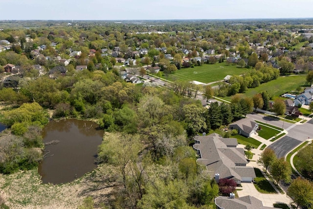 1111 Virgin Lake Dr, Stoughton, WI 53589 - aerial perspective of suburban area with a nearby body of water