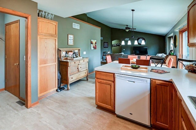 kitchen with visible vents, ceiling fan, light countertops, dishwasher, and vaulted ceiling