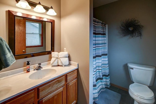 full bathroom with a shower with curtain, tile patterned floors, vanity, and toilet