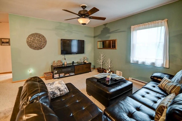 living area featuring baseboards, carpet, ceiling fan, and baseboard heating
