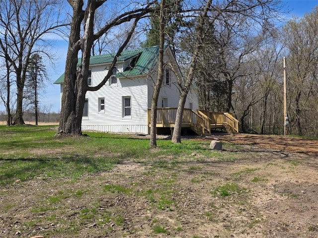 view of yard with a wooden deck