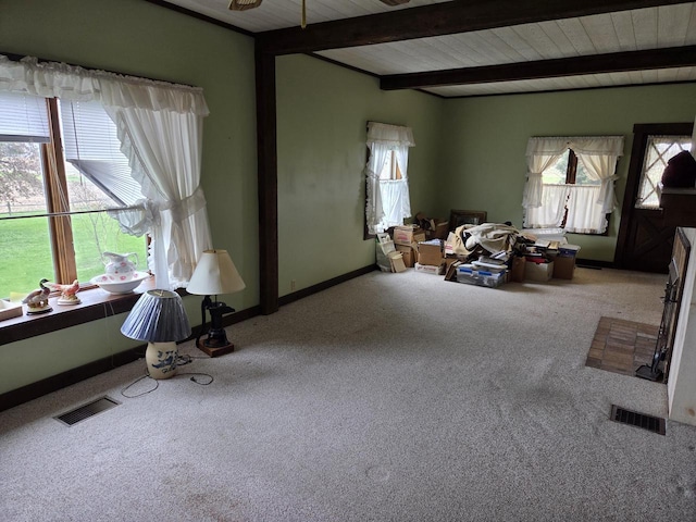 5986 Marsh Rd, Elkhorn, WI 53121 - living area featuring visible vents, carpet flooring, baseboards, and beam ceiling