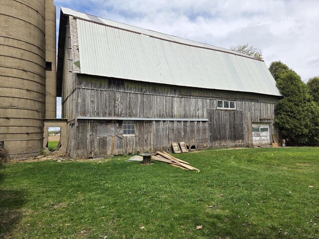 5986 Marsh Rd, Elkhorn, WI 53121 - view of barn with a yard