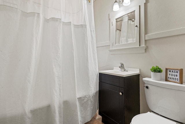 817 E Otjen St, Milwaukee, WI 53207 - bathroom featuring vanity, toilet, and a shower with curtain