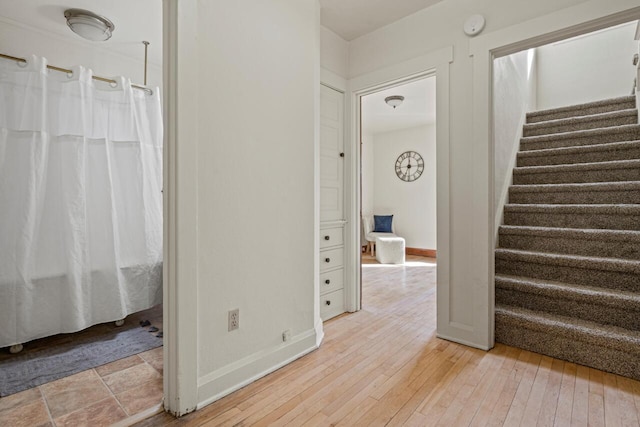 817 E Otjen St, Milwaukee, WI 53207 - stairs with baseboards and hardwood / wood-style flooring
