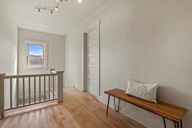 817 E Otjen St, Milwaukee, WI 53207 - hall featuring track lighting, baseboards, and hardwood / wood-style floors
