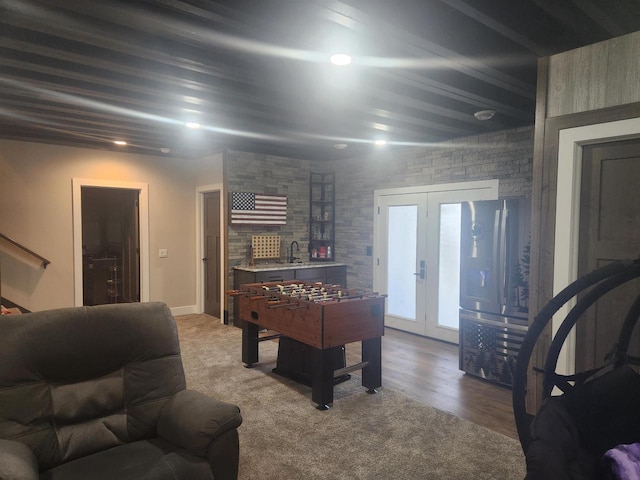 playroom with french doors and a sink