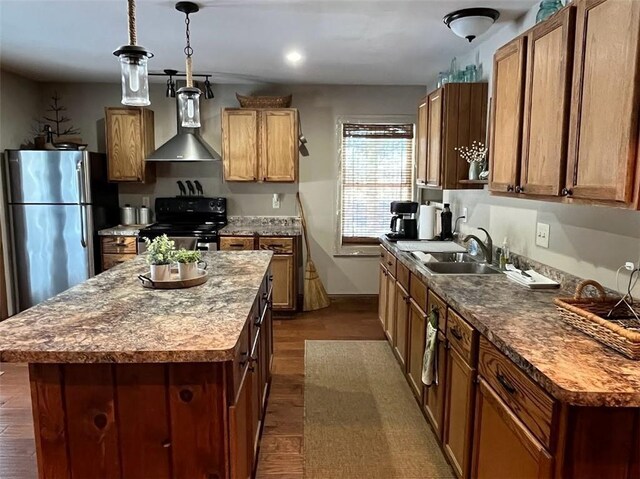 12014 102nd, Chippewa Falls, WI 54729 - kitchen featuring freestanding refrigerator, black range with electric cooktop, wall chimney exhaust hood, and dark wood-style floors