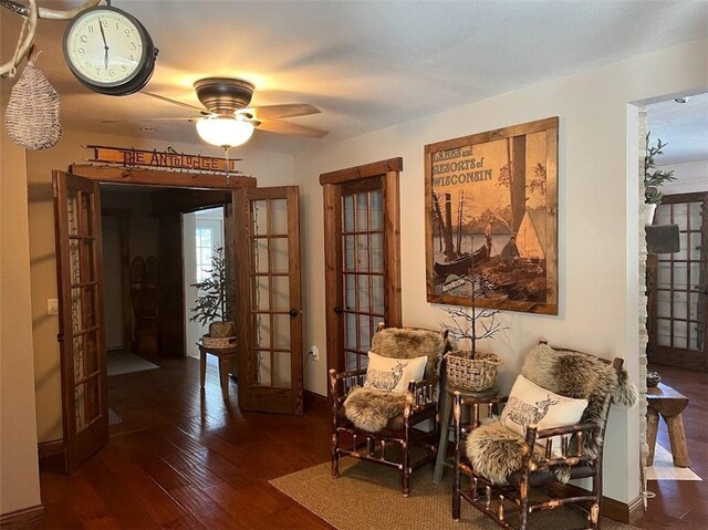 12014 102nd, Chippewa Falls, WI 54729 - sitting room with french doors, baseboards, ceiling fan, and hardwood / wood-style flooring