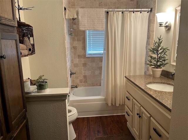 12014 102nd, Chippewa Falls, WI 54729 - full bath featuring vanity, a textured wall, shower / bathtub combination with curtain, and wood finished floors