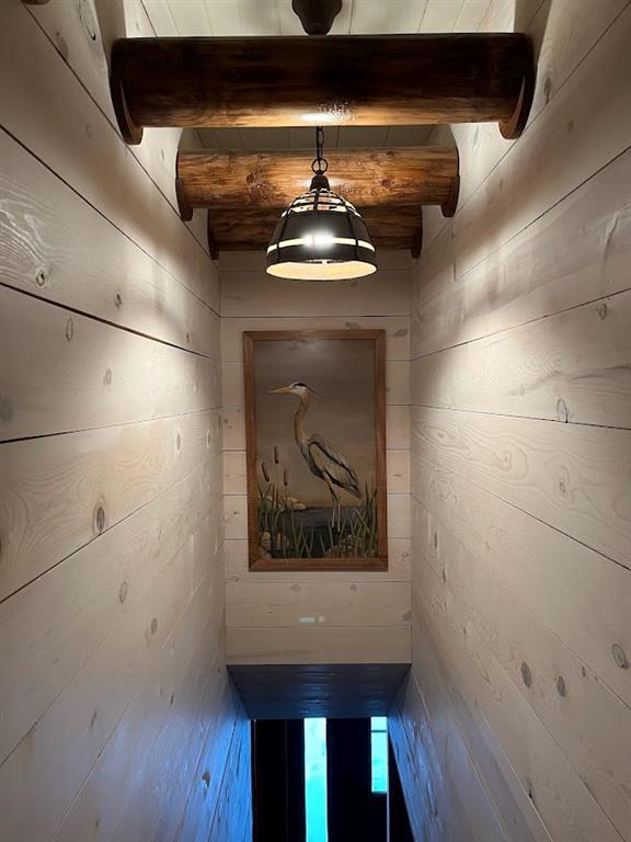 12014 102nd, Chippewa Falls, WI 54729 - hall featuring beamed ceiling and wood walls