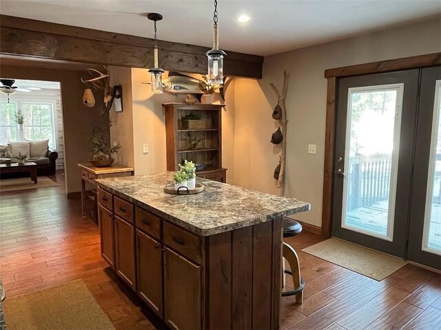 12014 102nd, Chippewa Falls, WI 54729 - bar with recessed lighting, hanging light fixtures, a ceiling fan, and dark wood finished floors