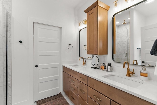 bathroom featuring double vanity, a sink, wood finished floors, and a shower stall