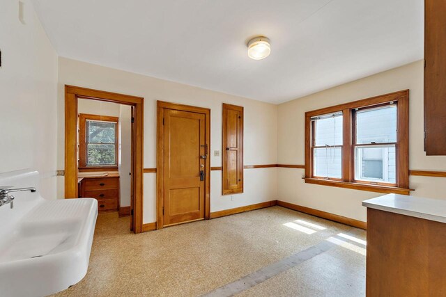 interior space with baseboards