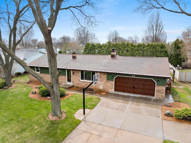 ranch-style home with a front yard, a chimney, brick siding, a shingled roof, and an attached garage