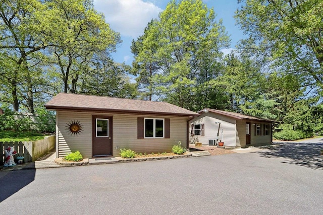 W11027B County Road O, Portage, WI 53901 - view of front facade with fence and an outdoor structure