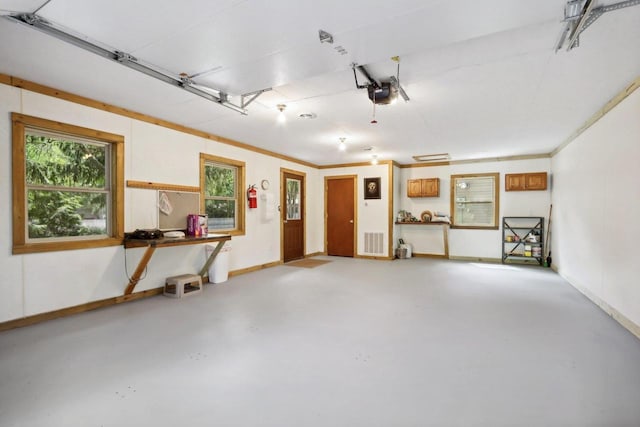 W11027B County Road O, Portage, WI 53901 - garage featuring a garage door opener and baseboards