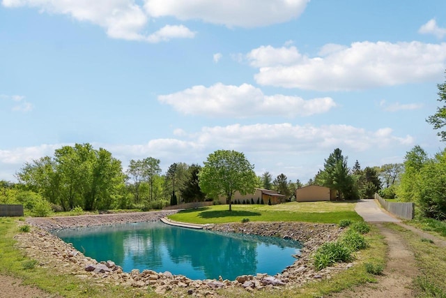 W11027B County Road O, Portage, WI 53901 - view of pool featuring a lawn