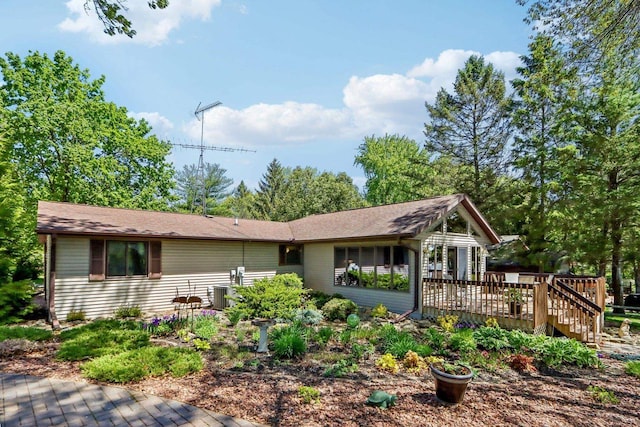 W11027B County Road O, Portage, WI 53901 - back of property featuring a wooden deck and central air condition unit