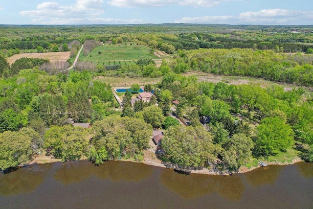 W11027B County Road O, Portage, WI 53901 - aerial view of property's location featuring a heavily wooded area and a nearby body of water