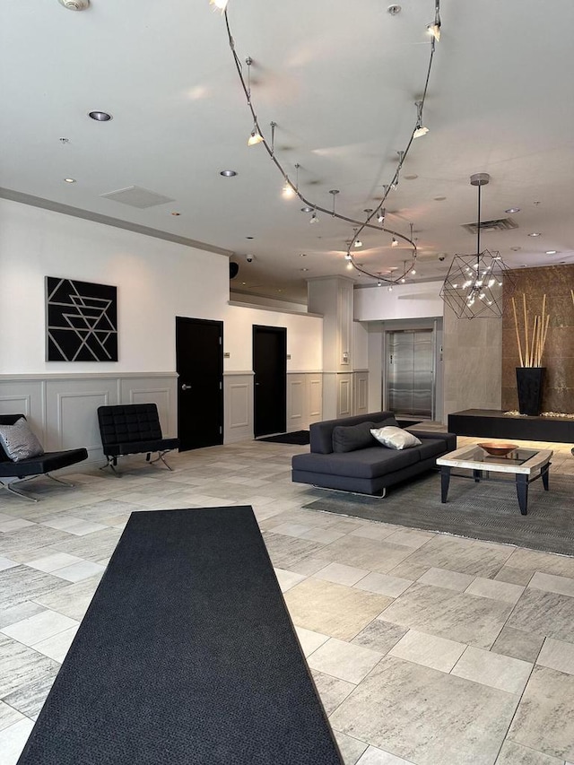 lobby featuring visible vents