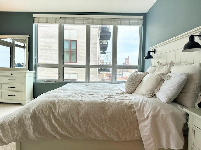 bedroom featuring a view of city