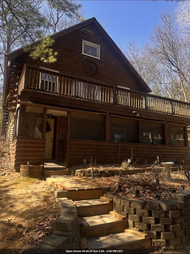 W7126 N Oakwood Cir, Neshkoro, WI 54960 - exterior space with log exterior