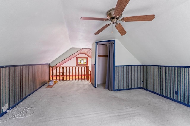 W7126 N Oakwood Cir, Neshkoro, WI 54960 - additional living space with carpet, vaulted ceiling, and a ceiling fan