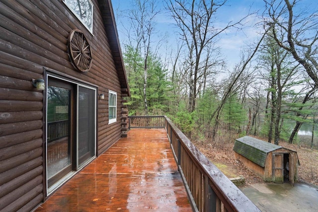 W7126 N Oakwood Cir, Neshkoro, WI 54960 - deck featuring a storage shed and an outbuilding