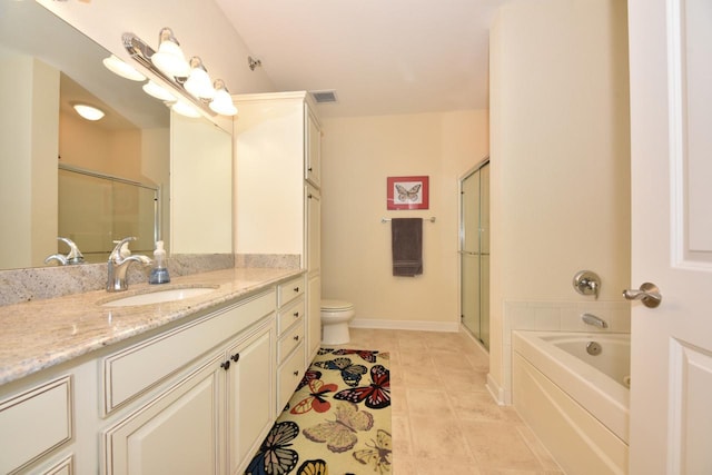 bathroom featuring visible vents, tile patterned floors, a shower stall, and vanity