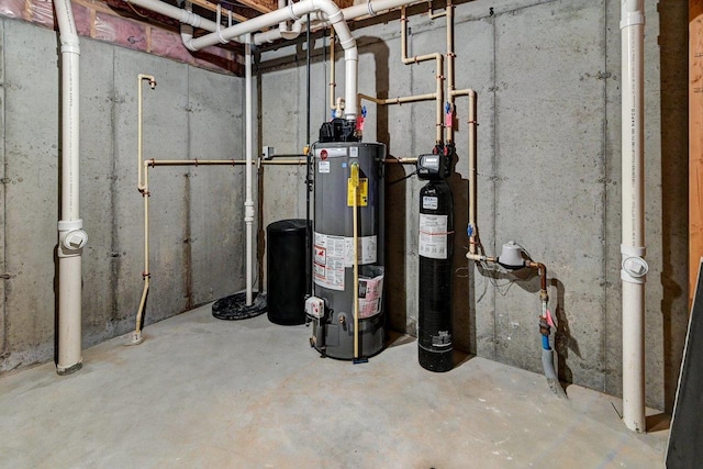 utility room with water heater