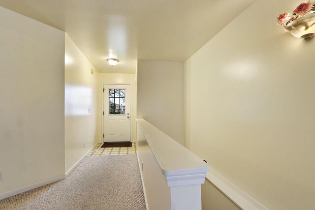956 Williams St, Walworth, WI 53184 - doorway to outside with baseboards and light colored carpet